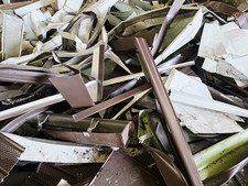 Pile of dried leaves and plant debris in an outdoor setting.